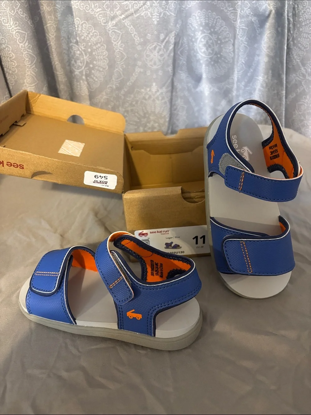 See Kai Run Blue and Orange Kids' Sandals with velcro Straps